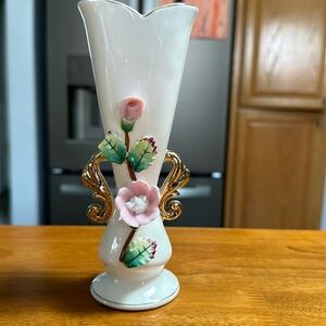 Vase with an attitude. Japanese made porcelain bud vase, with procelain flowers